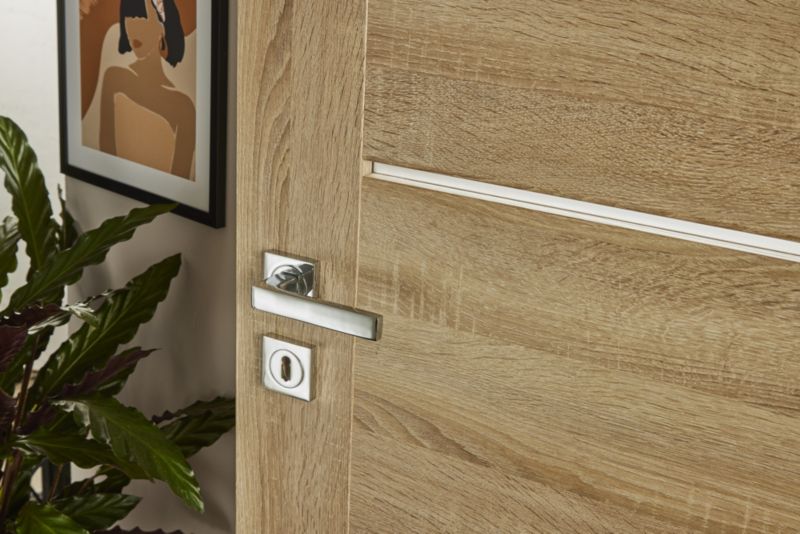 Dørhåndtag Qubik på roset i krom