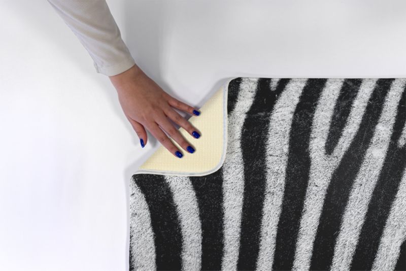 Blødt og skridsikkert soveværelsesgulvtæppe Tulup 75x45 cm Zebra – 1 stk.
