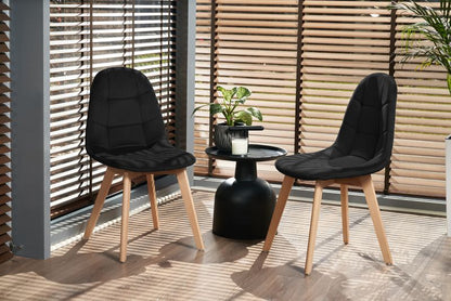 https://media2.castorama.pl/is/image/CastoramaPL/krzes-o-welurowe-jumi-tapicerowane-czarne-do-salonu-jadalni-wygodne-eleganckie-1-szt-~5900410592728_03c_MP?$MOB_PREV$&$width=600&$height=600