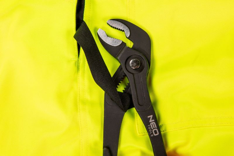 Unisex arbejdsbukser med seler NEO TOOLS M i intensivt synligt design, 1 stk.