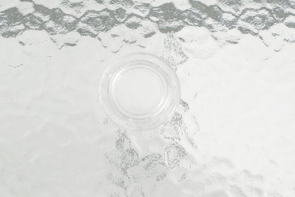 Bettso Porto rektangulært havebord med glasplade og parasolhul på sølvfarvede ben, transparent, 1 stk.