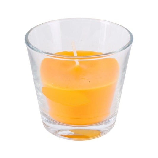 Gul-orange stearinlys i glas