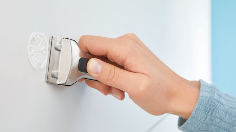 Tesa Moon toiletrulleholder med selvklæbende montering