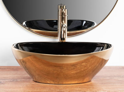 Sofia ovalt bordmonteret vask i sort-guld 41 x 34,5 x 15 cm, 1 stk